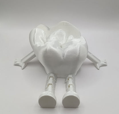 Accesoriu modern pentru cabinete stomatologice: suport de cărți de vizită în formă de dinte, printat 3D din material plastic alb lucios, un element decorativ practic și creativ.